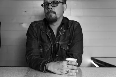 Charles Emils Sessions - Anders Landelius alias Slidin' Slim